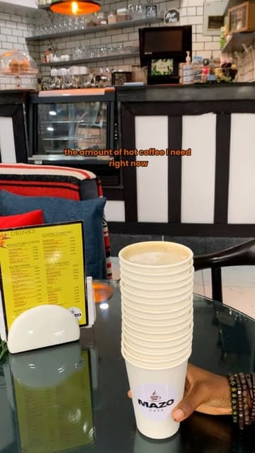 Golden hour at Adeola Odeku. The lighting hits our storefront just right. Come sit, relax, and enjoy your evening cup. 🌅
